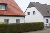 Fassadenbeschichtung an Reihenhaeusern in Wittenberg